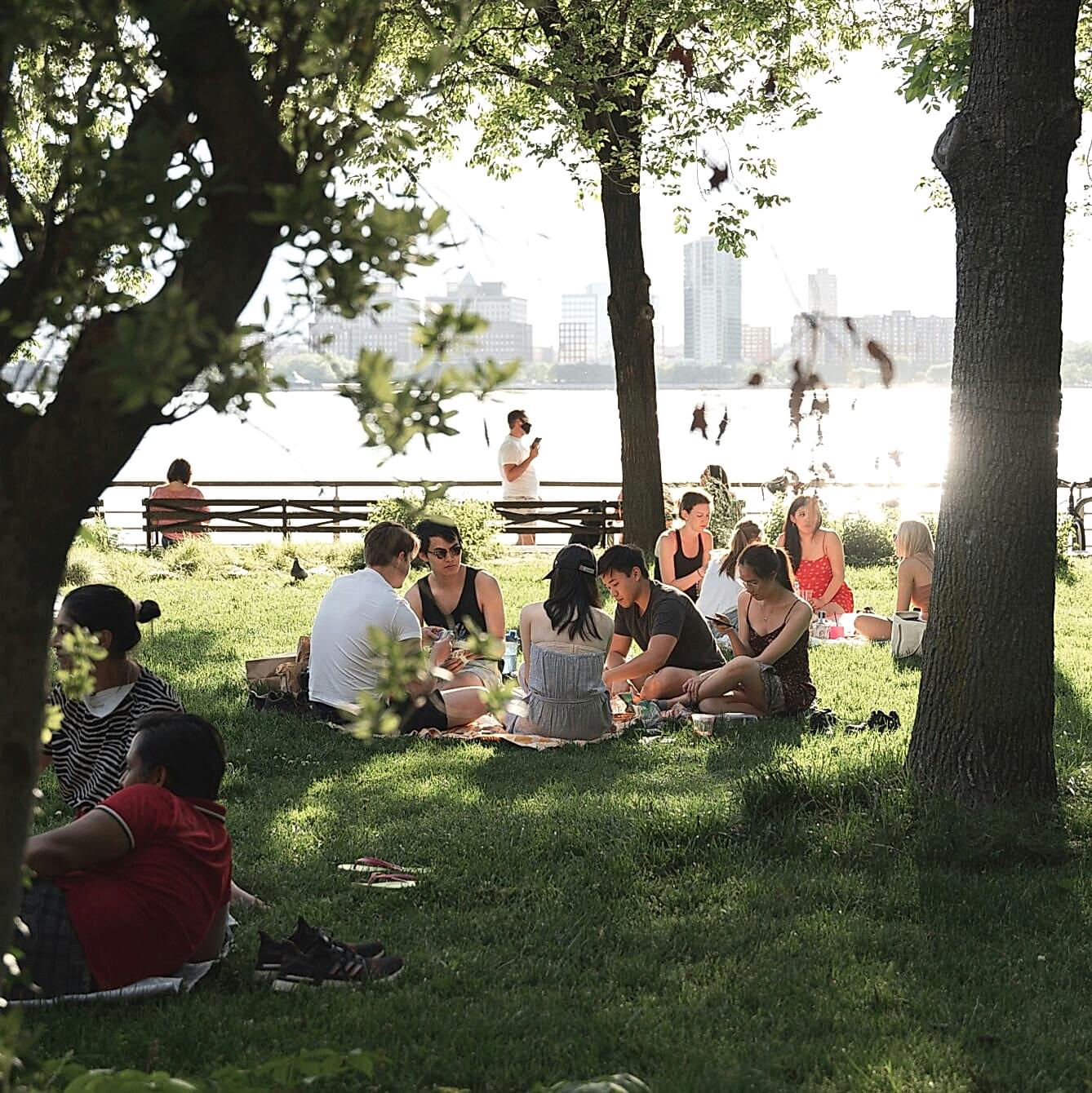 People sitting outside at a park