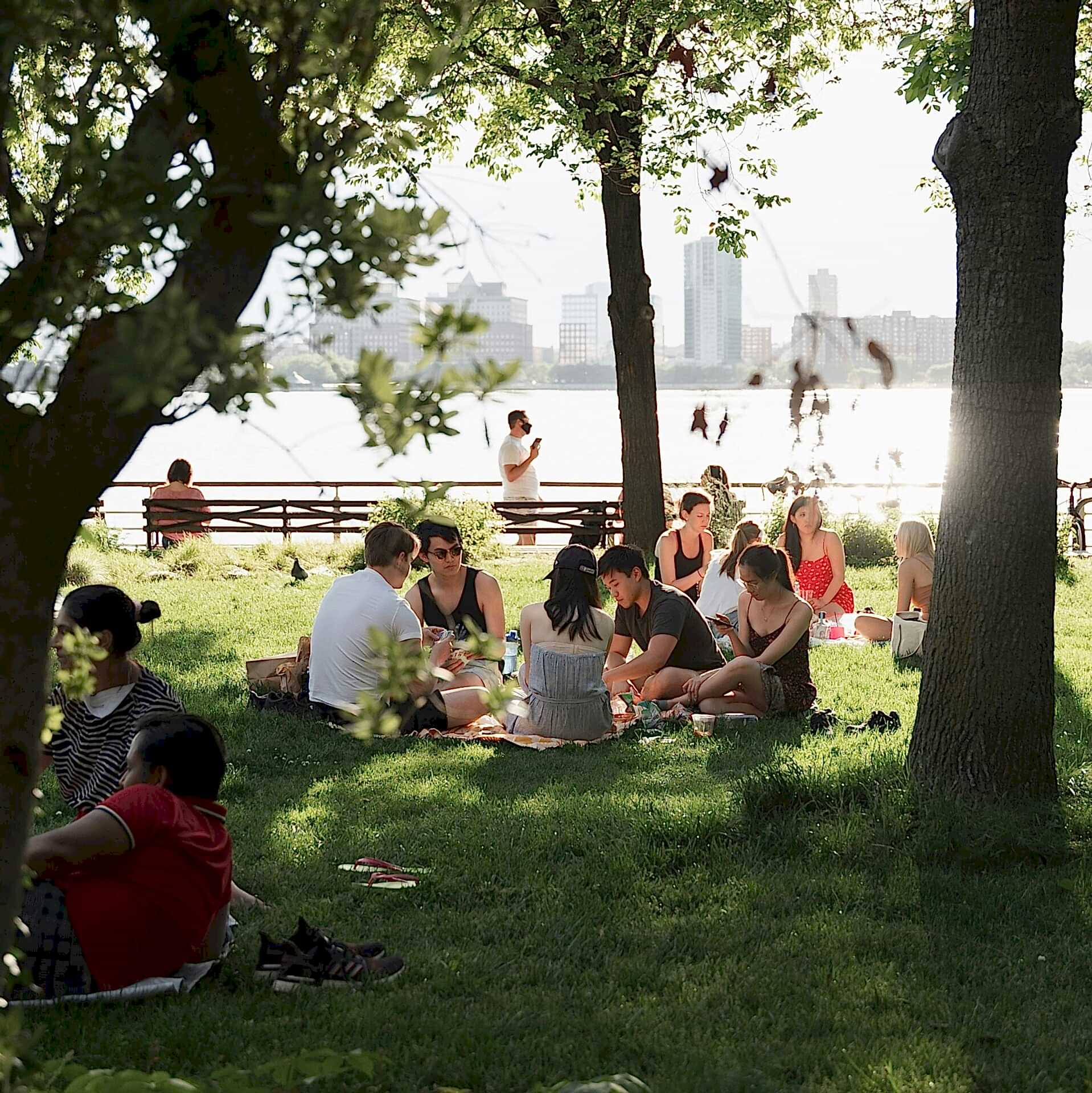 People sitting outside at a park